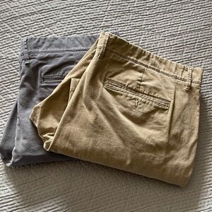 2 pairs of Goodfellow khakis in size 42w x 30l, khaki and gray.